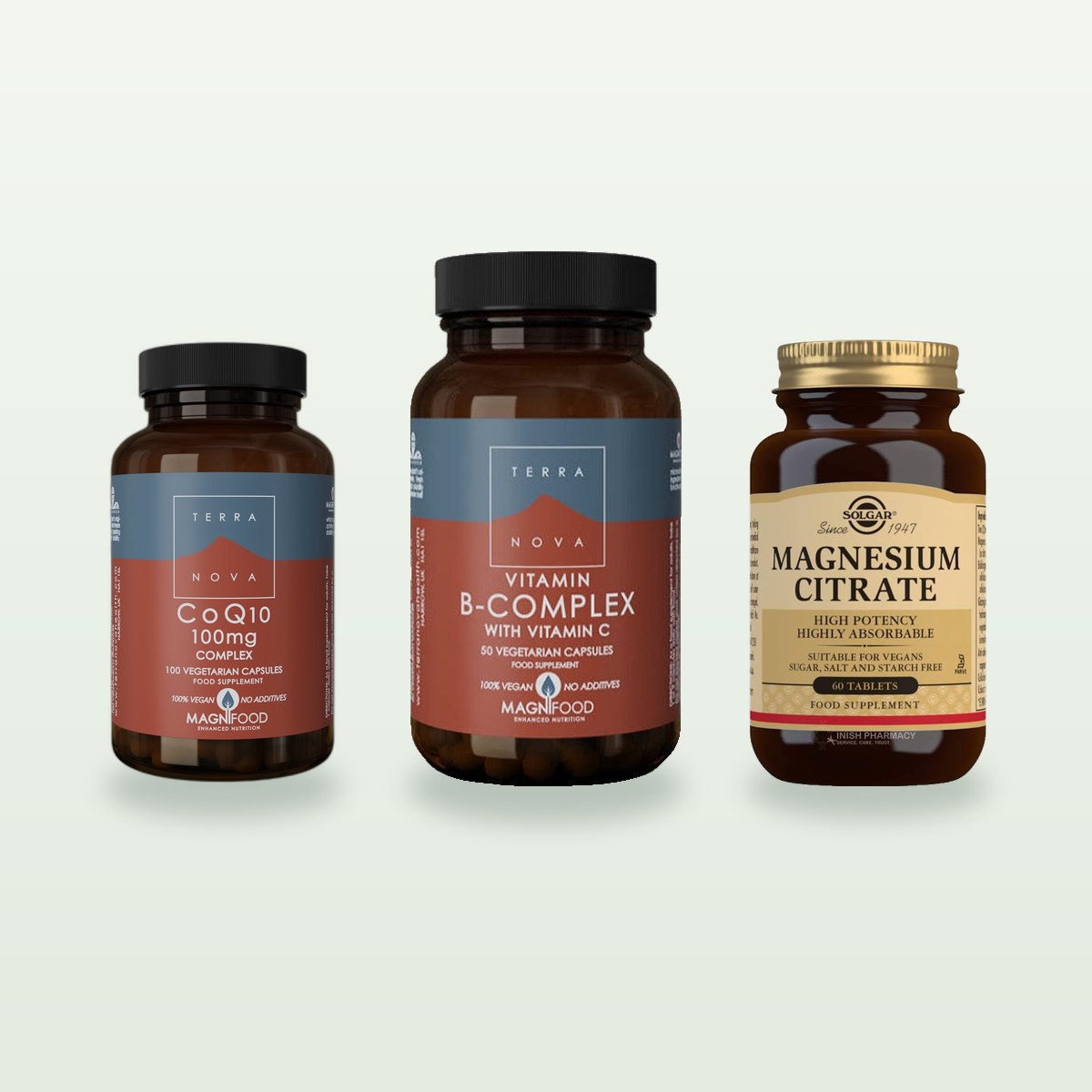 Three supplement bottles on a pale green background: Viridian Vitamin B12 1000ug, Terranova Vitamin B-Complex with Vitamin C and Solgar Magnesium Citrate.